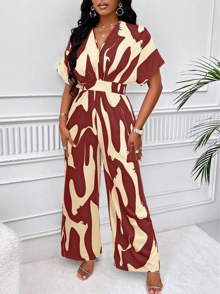 Allover print batwing sleeve jumpsuit in burgundy