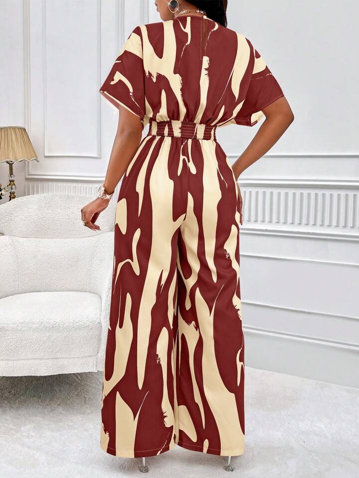 Allover print batwing sleeve jumpsuit in burgundy