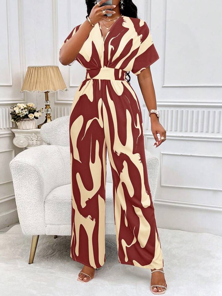 Allover print batwing sleeve jumpsuit in burgundy