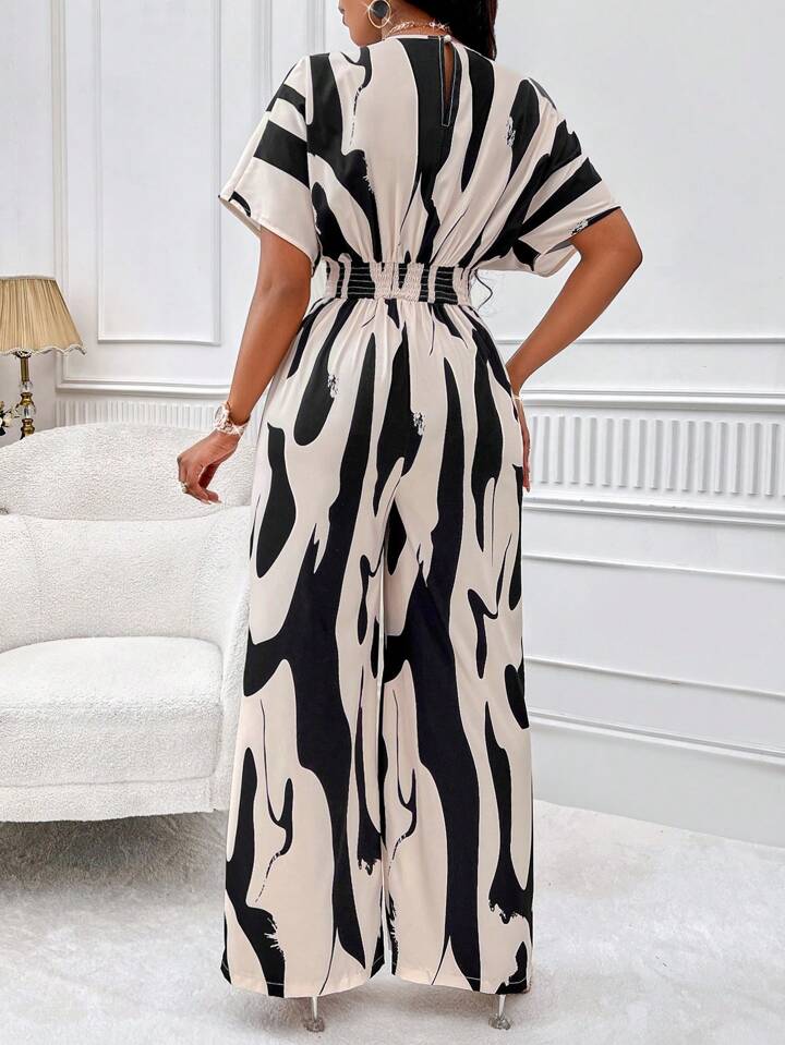 Allover print batwing sleeve jumpsuit in nude