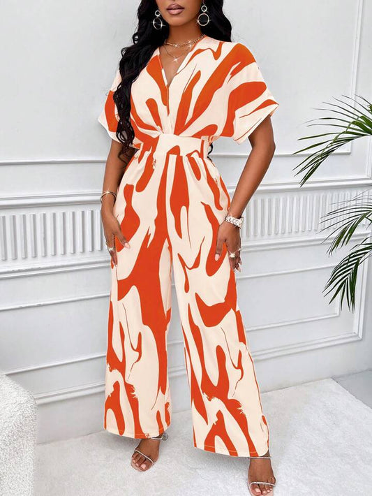 Allover print batwing sleeve jumpsuit in orange