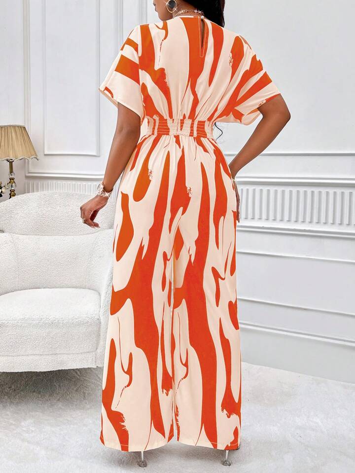 Allover print batwing sleeve jumpsuit in orange