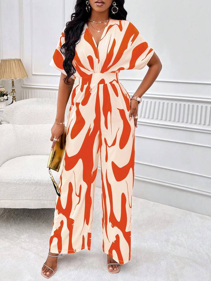 Allover print batwing sleeve jumpsuit in orange