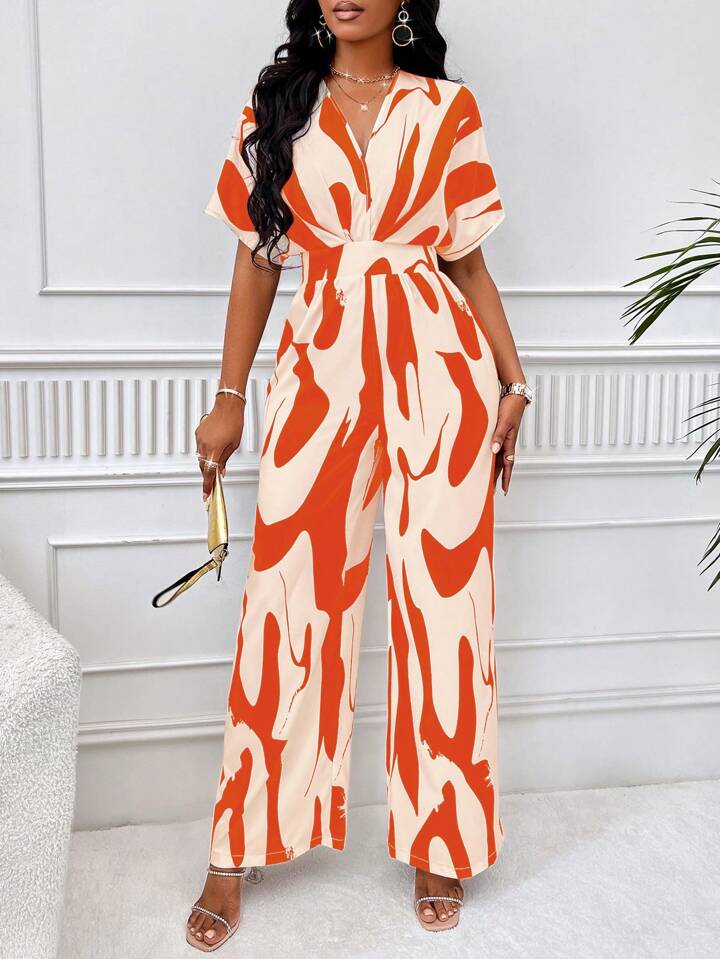 Allover print batwing sleeve jumpsuit in orange