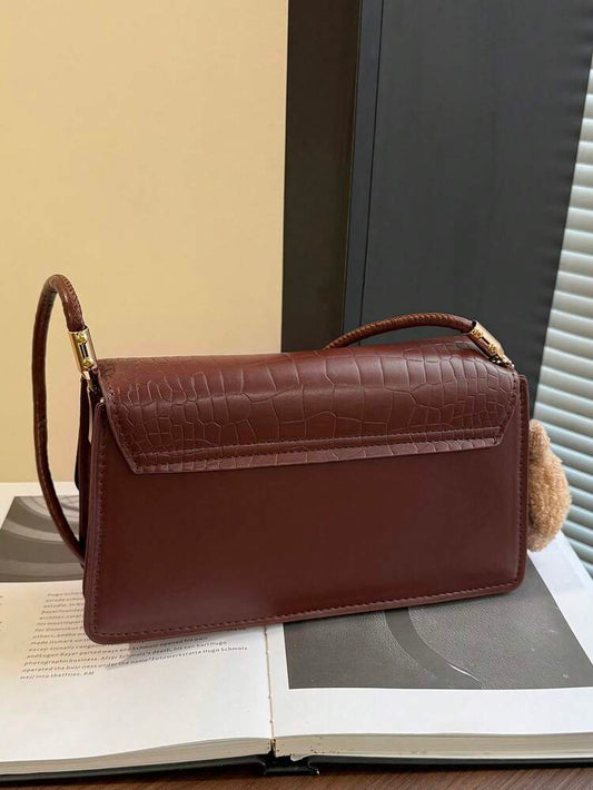 Crocrodile embossed flap shoulder bag in brown