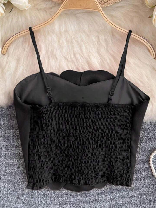 Floral decor spaghetti strap top in black