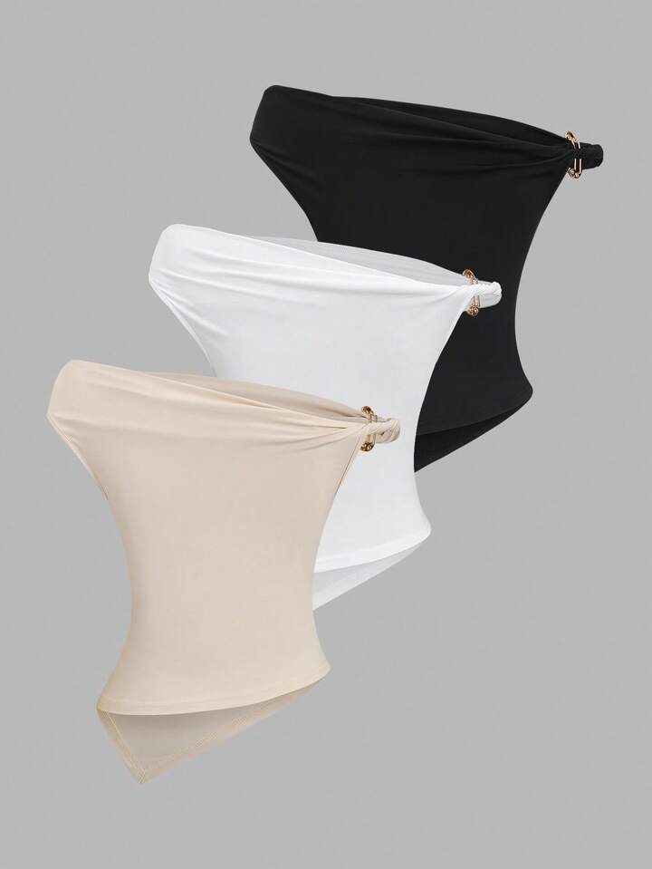 Gold decor twist asymmetric top in black