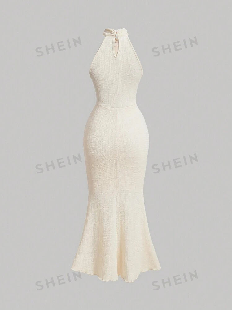 Halterneck fishtail hem dress in nude