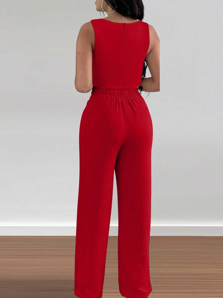 Hollow cut out tied crop top & straight leg pant set in red