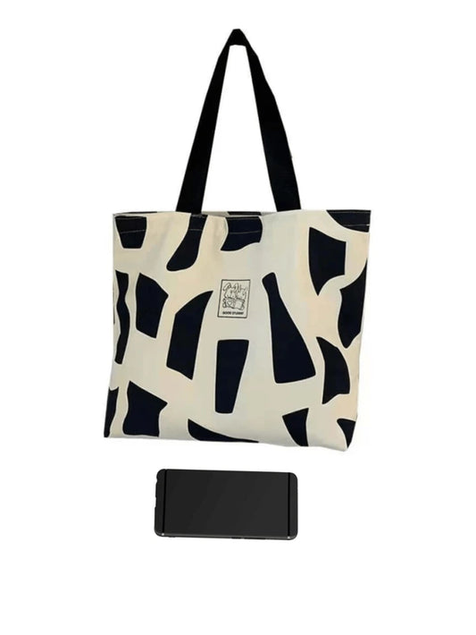 Letter graphic geometric pattern tote bag in black