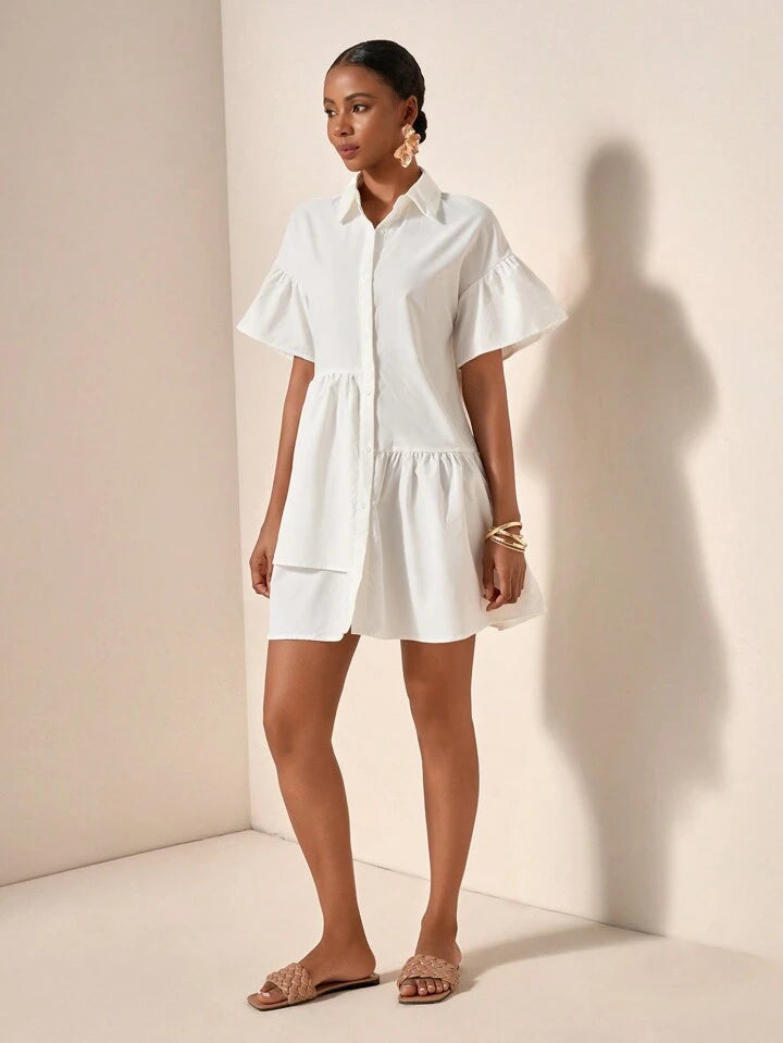 Ruffle hem smock dress in white