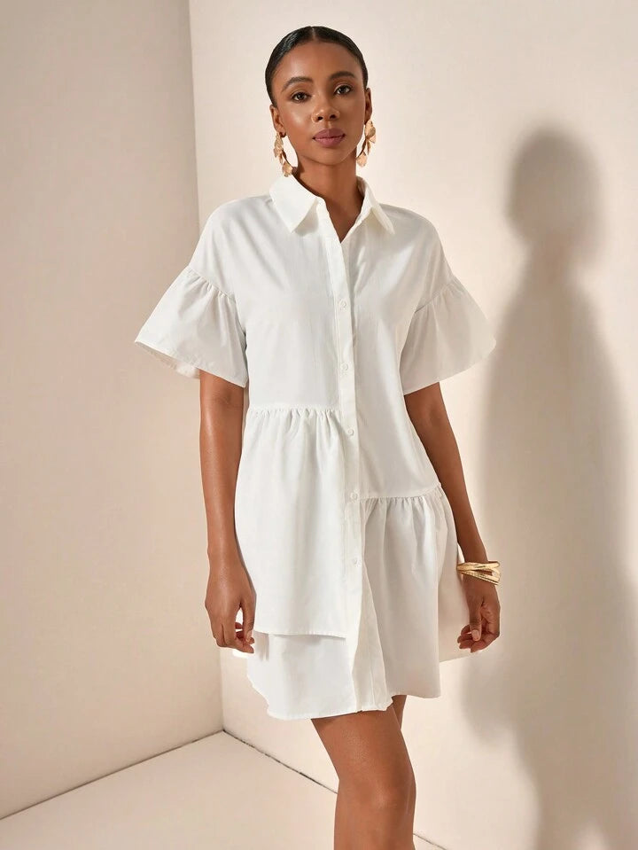 Ruffle hem smock dress in white