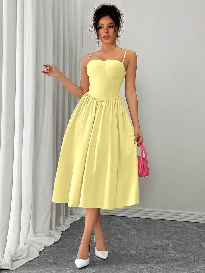Ruffle hem spaghetti strap waist dress in yellow