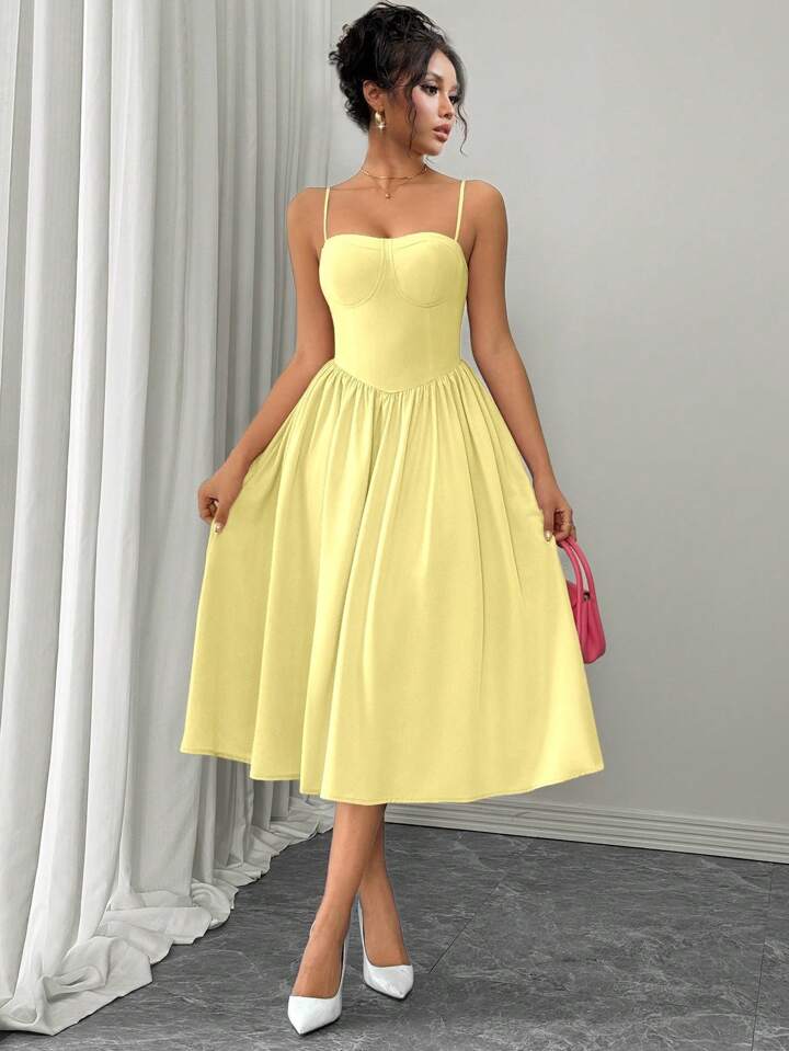Ruffle hem spaghetti strap waist dress in yellow