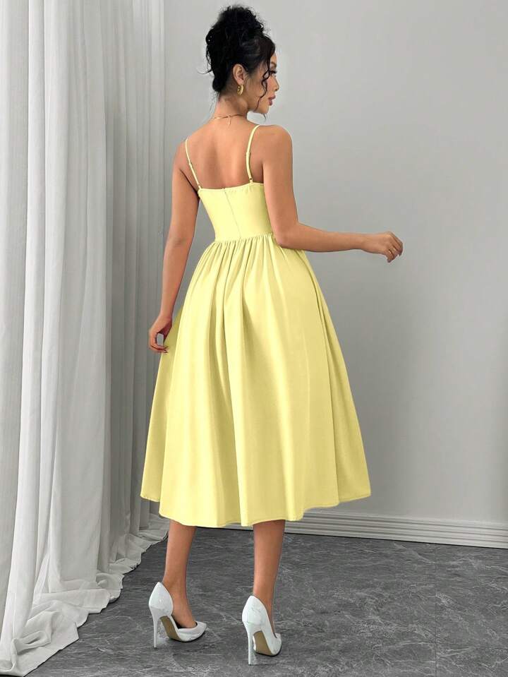 Ruffle hem spaghetti strap waist dress in yellow