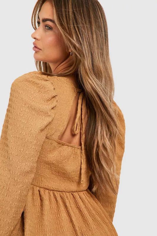 Textured puff sleeve long sleeve mini dress in brown