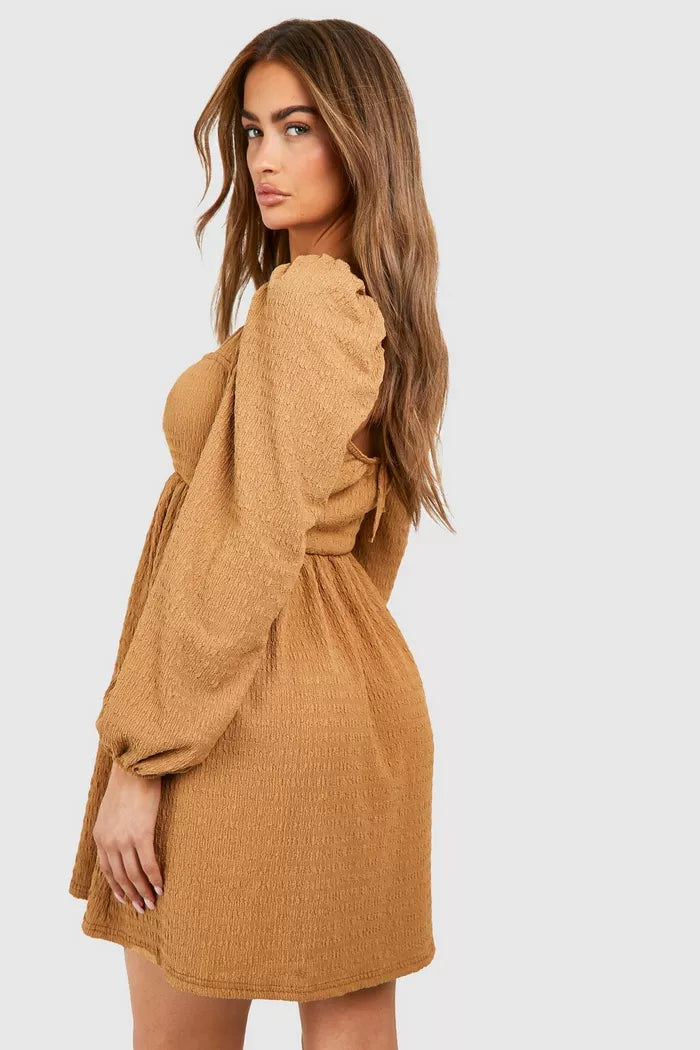 Textured puff sleeve long sleeve mini dress in brown
