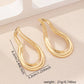 1pair asymmetrical earrings in gold