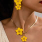 2pcs floral pendant necklace & earinngs set in yellow