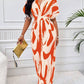 Allover print batwing sleeve jumpsuit in orange