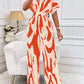 Allover print batwing sleeve jumpsuit in orange