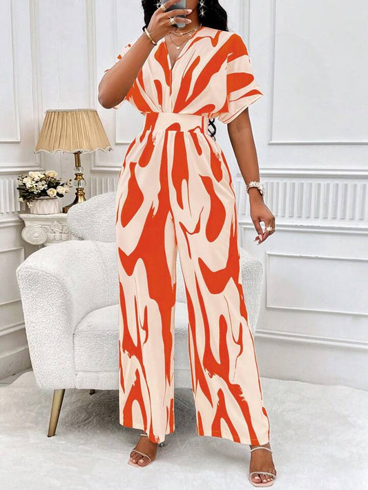Allover print batwing sleeve jumpsuit in orange