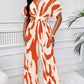 Allover print batwing sleeve jumpsuit in orange