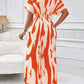 Allover print batwing sleeve jumpsuit in orange