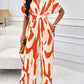 Allover print batwing sleeve jumpsuit in orange