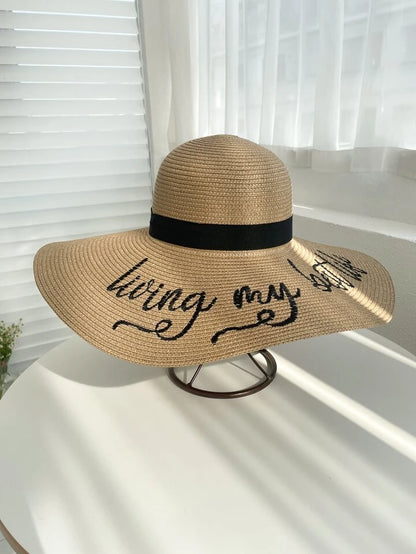 Alphabet pattern wide brim straw hat in khaki