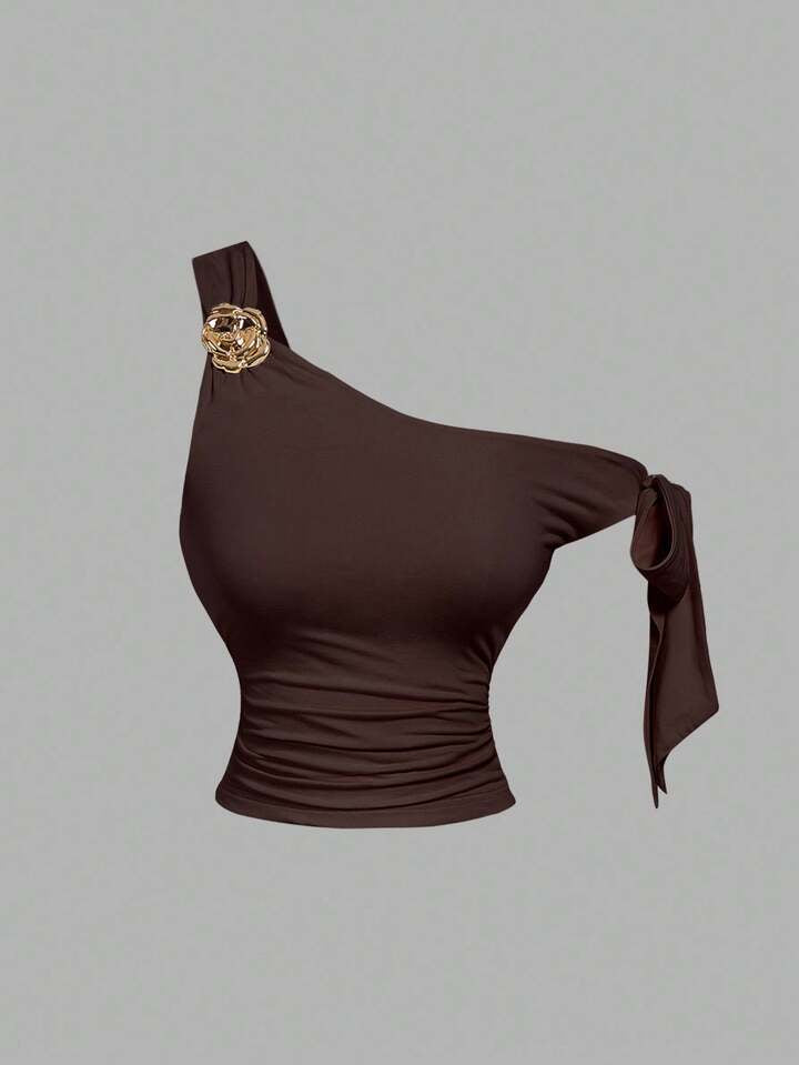 Asymmetrical bowtie metal decor top in brown