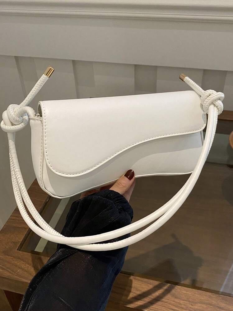 Asymmetrical flap adjustable shoulder bag in white