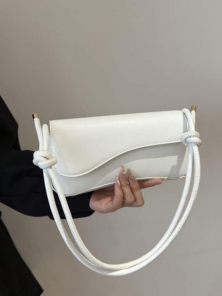 Asymmetrical flap adjustable shoulder bag in white