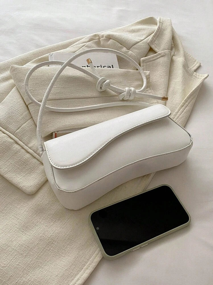 Asymmetrical flap adjustable shoulder bag in white