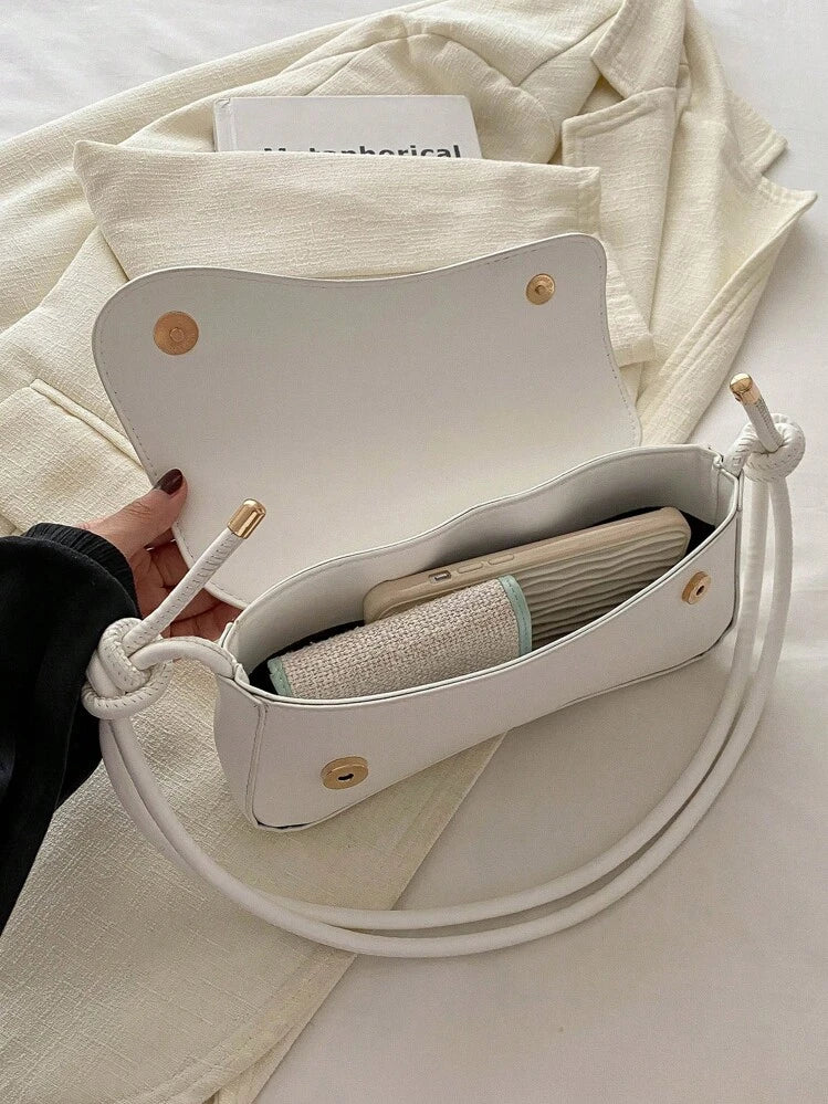 Asymmetrical flap adjustable shoulder bag in white