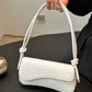 Asymmetrical flap adjustable shoulder bag in white