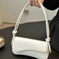 Asymmetrical flap adjustable shoulder bag in white