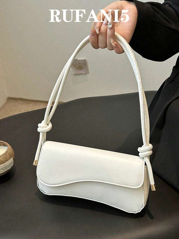 Asymmetrical flap adjustable shoulder bag in white