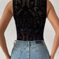 Baroque print mock neck bodysuit in black