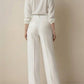 Belted high waist pleated loose pants in white