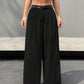 Belted high waist wide leg pants in black