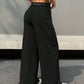 Belted high waist wide leg pants in black