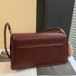 Crocrodile embossed flap shoulder bag in brown