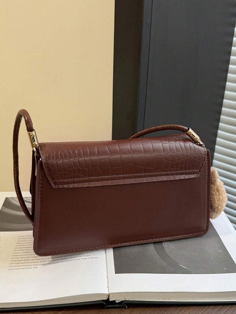 Crocrodile embossed flap shoulder bag in brown