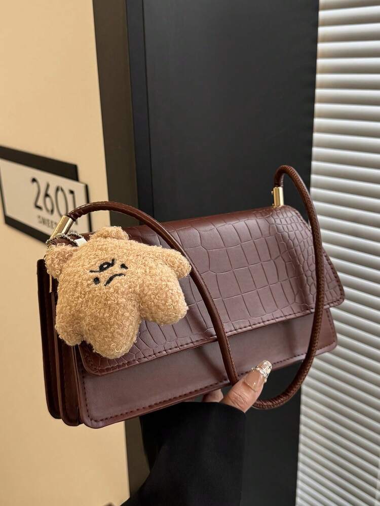 Crocrodile embossed flap shoulder bag in brown