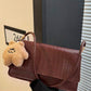 Crocrodile embossed flap shoulder bag in brown