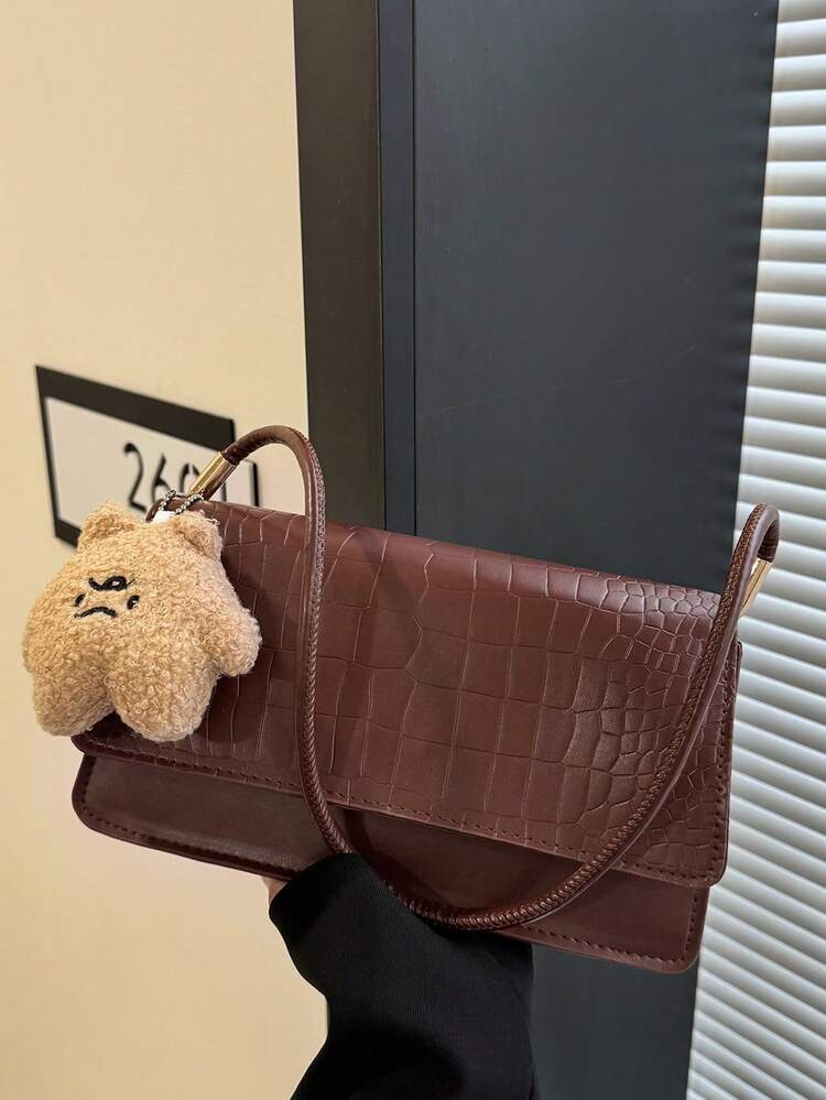 Crocrodile embossed flap shoulder bag in brown