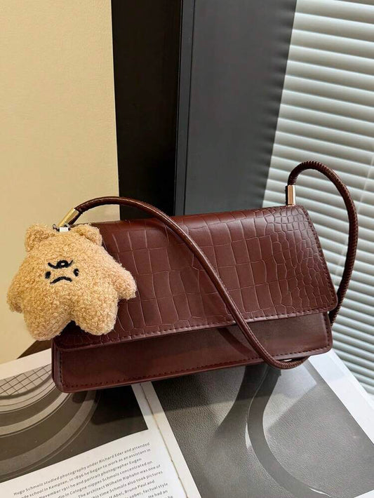 Crocrodile embossed flap shoulder bag in brown