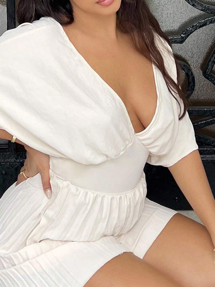 Deep v-neck batwing sleeve pleated romper in nude