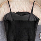 Floral decor spaghetti strap top in black